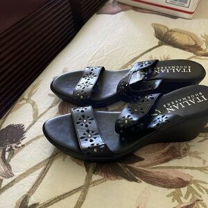 Black leather sandals with silver studs